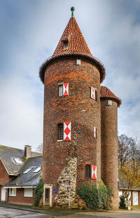 Low angle view of old building against sky