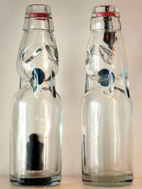 Close-up of drink in glass jar on table