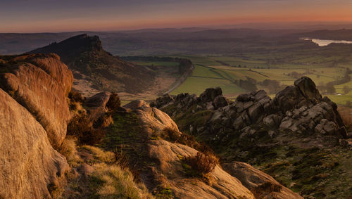 Scenic view of landscape against sky during sunset