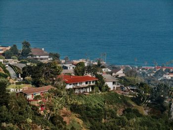 High angle view of town by sea