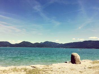 Scenic view of sea against blue sky