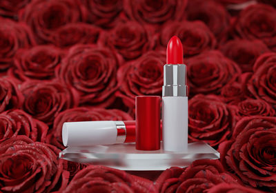 Close-up of red rose on table