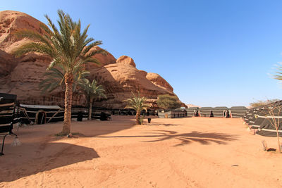 Tent at desert against mountain