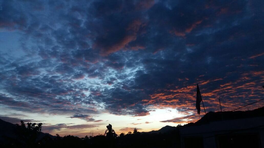 cloud - sky, sky, sunset, silhouette, cloudscape, scenics, dramatic sky, low angle view, outdoors, nature, no people, tree, beauty in nature, storm cloud, thunderstorm, astronomy, star - space, day