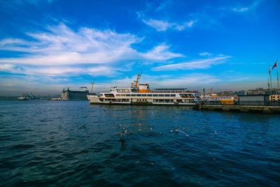 Istanbul city lines ferry near the kadikoy pier at sunset.