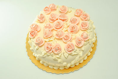 Close-up of cupcakes on table against white background