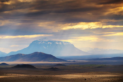 Scenic view of landscape against sky during sunset