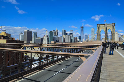 View of cityscape against blue sky