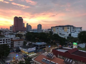 Cityscape against sky during sunset