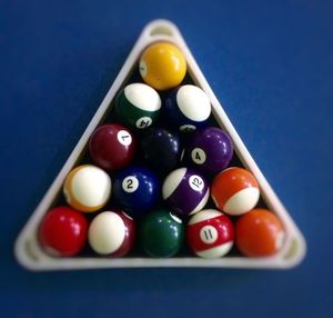 Close-up of multi colored balls on table