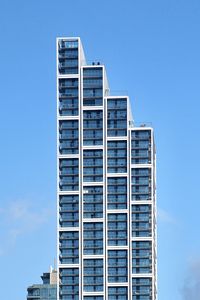 Low angle view of modern building against clear sky