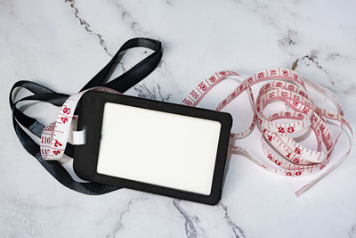 High angle view of smart phone on table