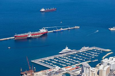 View of ships boats in calm blue sea