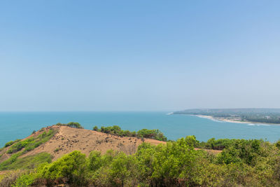 Scenic view of sea against clear sky