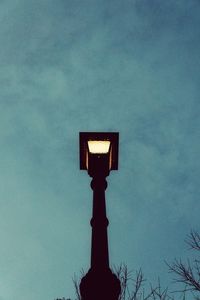 Low angle view of illuminated light against sky