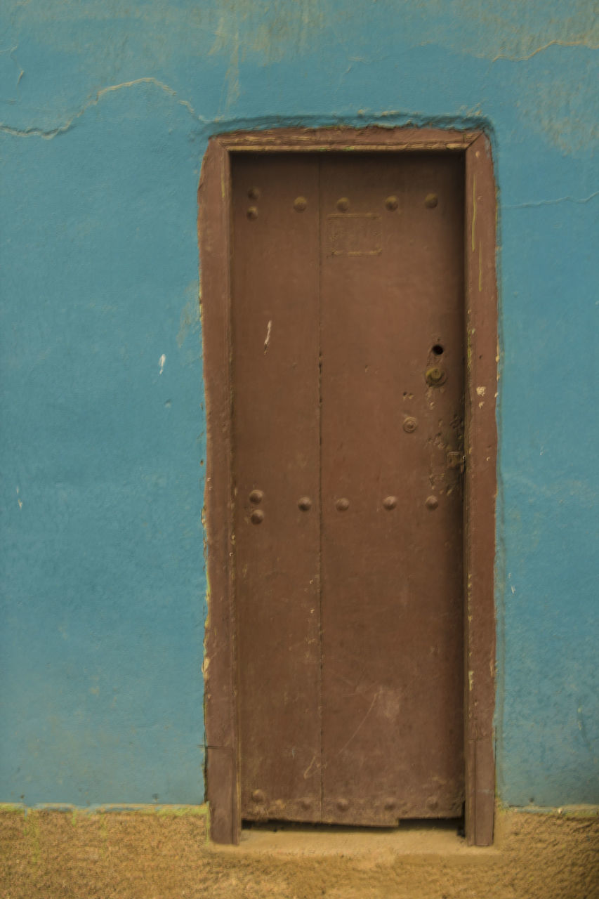 CLOSED METAL DOOR OF BUILDING