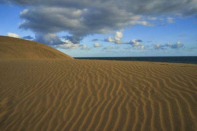 Scenic view of desert against sky