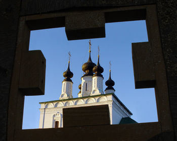 Low angle view of building against blue sky