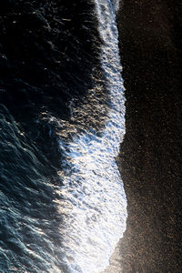 Close-up of sea waves against sky