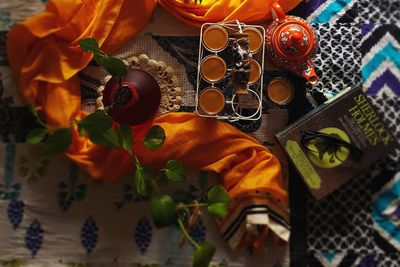 High angle view of orange flowering on table