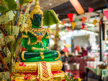 Close-up of buddha statue in market