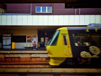 Yellow train at railroad station