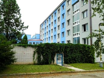 Houses against sky in city