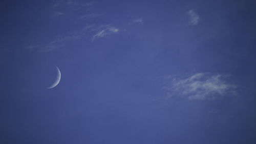 Low angle view of moon in sky