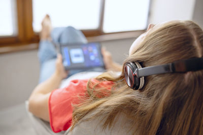 Close-up of woman using mobile phone