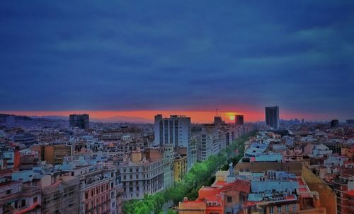 High angle view of buildings against sky during sunset