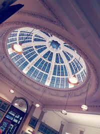 Low angle view of illuminated ceiling