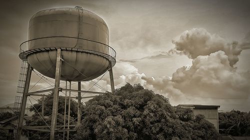 Low angle view of water tower against sky