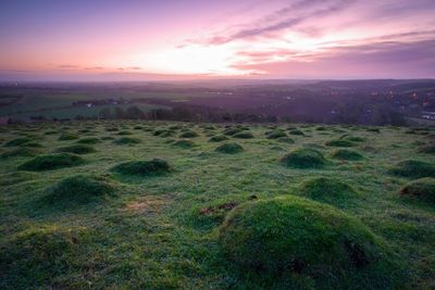 Scenic view of landscape against sky during sunset