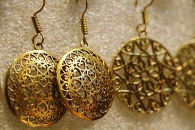 Close-up of gold colored metal hanging