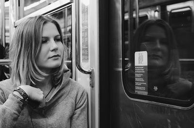 Woman sitting in train