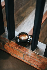 High angle view of rusty metal on table