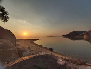 Scenic view of sea against sky during sunset