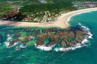 High angle view of surf on beach