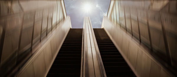 Couple escalator to the sky , abstract background of rising way to success