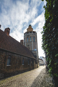 View of cathedral and buildings against sky