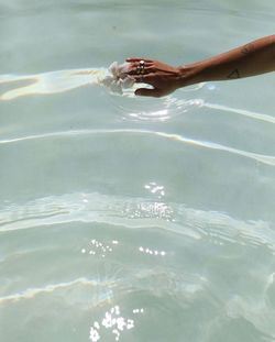 Person surfing in swimming pool