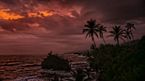 Scenic view of sea against sky at sunset