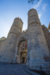 Low angle view of old building against sky