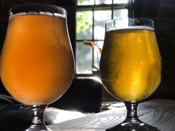 Close-up of beer in glass on table