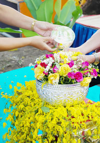 Close-up of woman holding bouquet