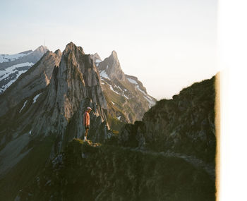 Scenic view of mountains against sky during sunset