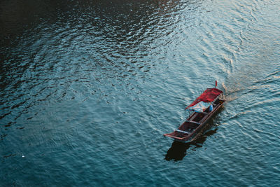 High angle view of boat sailing in river