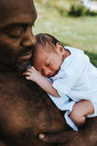 Father with newborn baby