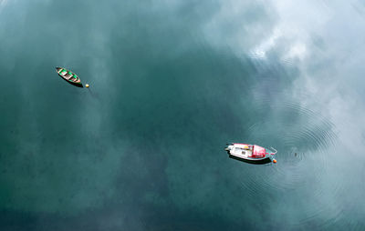 Aerial, drone image of two fishing boats in water