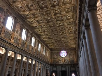 Low angle view of illuminated ceiling